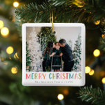 Modern & Colorful Merry Christmas Family Photo Ceramic Ornament<br><div class="desc">This simple and fun family Merry Christmas ornament features a place for you to add your names, with ‘Merry Christmas’ in colorful bright typography, as well as room for you to add your own photo. On a back is a matching colorful polka dot design. The perfect modern xmas holiday decor...</div>