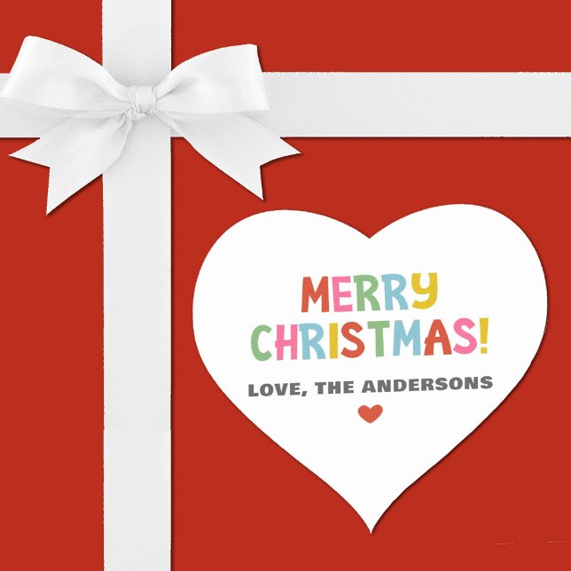 Modern Colorful Merry Christmas Heart Sticker (A cute heart shaped sticker with the words Merry Christmas is colorful typography.)