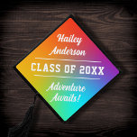 Modern Colorful Rainbow Adventure Awaits Graduation Cap Topper<br><div class="desc">This graduation cap topper features a colorful rainbow hued background, simple typography, and modern calligraphy script. The topper has your graduate's name, class of (year), and the phrase "Adventure Awaits". All of the these can be edited and customized using the design tool. You can also remove the background and replace...</div>
