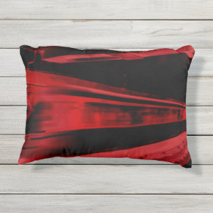 Modern, cool motion concept in red and black outdoor pillow