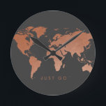 Modern Copper Globe World Map Round Clock<br><div class="desc">Our unique soft-brushed copper world map design on a dark gray background color that can be changed to match your office or room decor and "just go" wording reminding you to satisfy your wanderlust and book that next trip. Wording is editable and removable so you can personalize with your favorite...</div>