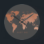 Modern Copper Globe World Map Round Clock<br><div class="desc">Our unique soft-brushed copper world map design on a dark gray background color that can be changed to match your office or room decor and "just go" wording reminding you to satisfy your wanderlust and book that next trip. Wording is editable and removable so you can personalize with your favorite...</div>