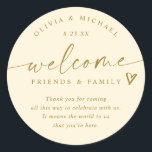 Modern Cream & Gold Wedding Welcome Hotel Bag Classic Round Sticker<br><div class="desc">Cream and Gold Hotel Bag Stickers: Add a timeless touch to your wedding welcome bags with these cream and gold modern handwriting stickers. Each 3-inch round sticker features the phrase “welcome friends & family” in elegant script with a gold-tone accent and the couple’s names and date below. The warm cream...</div>