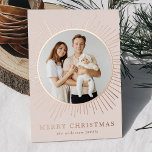Modern Cream Sunburst Merry Christmas 2 Photo Foil Holiday Card<br><div class="desc">Stylish and modern holiday card featuring your photo nestled inside of a rose gold foil sunburst frame. Personalize the sunburst Christmas card with your family name in rose gold foil lettering on a cream background or a color of your choice. The back of the card displays the year and an...</div>