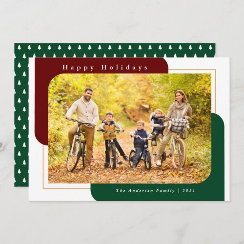 Modern Curved Photo Green Happy Holidays Holiday Card - This Christmas photo card features a modern design offering a horizontal photo frame with two curved corners. This same modern shape appears in the background in a dark red and dark green.  The greeting reads: "Happy Holidays".