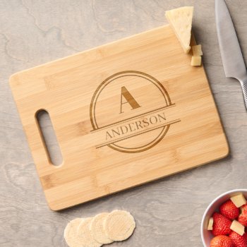 Modern Custom Family Name And Initial Etched  Cutting Board by Gorjo_Designs at Zazzle