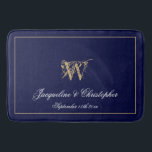 Modern Cute Blue Monogram Names Newlywed Wedding Bath Mat<br><div class="desc">Modern Cute Blue Monogram Names Newlywed Wedding Bath Mat. Chic stylish personalized navy blue and gold monogrammed bath mat. Classic script for the monogrammed last name initial, the names of the bride and groom and the date on a chic navy blue background. A perfect gift for newly weds, engaged couples...</div>
