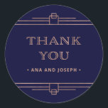 Modern Deco | Elegant Rose Gold on Navy Wedding Classic Round Sticker<br><div class="desc">These glamorous wedding stickers feature a modern spin on classic art deco. Ornate, faux rose gold look geometric borders and ornamentation decorate an elegant dark navy blue background for a dramatic, vintage wedding look. Classic faux rose gold typography says "thank you", making these perfect to add to your wedding favors....</div>
