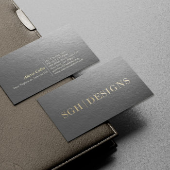 Modern Designer Minimal Black & Gold Embossed Text Business Card by ReadyCardCard at Zazzle