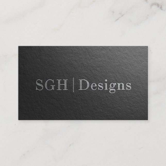 Modern Designer Minimal Black Silver Embossed Text Business Card (Front)