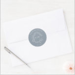 Modern Dusty Blue Leafy Crest Monogram Wedding Classic Round Sticker<br><div class="desc">We're loving this trendy, modern dusty blue wedding Envelope Seal! Simple, elegant, and oh-so-pretty, it features a hand drawn leafy wreath encircling a modern wedding monogram. It is personalized in elegant typography, Finally, it is trimmed in a delicate frame. Veiw suite here: https://www.zazzle.com/collections/dusty_blue_leafy_crest_monogram_wedding_invitation-119130199045408312 Contact designer for matching products to complete...</div>
