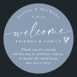 Modern Dusty Blue Wedding Welcome Hotel Bag Classic Round Sticker<br><div class="desc">Dusty Blue Hotel Bag Stickers: Welcome guests to your celebration with these dusty blue modern handwriting hotel bag stickers, a stylish way to complete your welcome gifts. Each 3-inch round sticker features the phrase “welcome friends & family” with a small heart accent above your short message. The couple’s names and...</div>