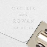 Modern Elegance Couple Names Monogram Embosser<br><div class="desc">This modern elegance wedding monogram embosser features the couple's first names in tall block lettering with a graceful script "and" centered between them as the design centerpiece. Personalize with the bride and groom's first names for a clean typographic monogram keepsake. A beautiful engagement or bridal shower gift perfect for sealing...</div>