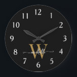 Modern Elegant Black Gold Monogram Name Script Large Clock<br><div class="desc">Girly Stylish Modern Elegant Black and Gold Monogram Initial Name Script Custom Personalized Large Clock. This design featuring a first name in a pretty hand lettered swash tail font calligraphy (or typography) with monogram initial in gold and white on black. Easy to customize it. Great stylish feminine housewarming gift, also...</div>