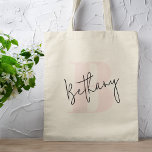 Modern Elegant Blush Pink Monogram Tote Bag<br><div class="desc">A handwritten monogram design in an elegant style in black informal casual script typography over a blush bold pink initial oversized letter. The text can easily be customized for a design as unique as you are!</div>