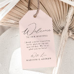 Modern Elegant Blush Wedding Welcome Gift Tags<br><div class="desc">These elegant calligraphy wedding welcome gift tags are perfect for both casual and formal weddings. The design features a modern black calligraphy script with a light blush pink background or color of your choice. Personalize the blush wedding welcome gift tags with a short welcome message, your names, etc. The minimalist...</div>