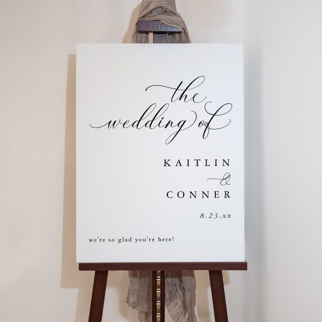 Modern Elegant Calligraphy Wedding Welcome Sign (Wedding welcome sign with elegant calligraphy and a modern look that says "we're so glad you're here)