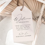 Modern Elegant Cream Wedding Welcome Gift Tags<br><div class="desc">These elegant calligraphy wedding welcome gift tags are perfect for both casual and formal weddings. The design features a modern black calligraphy script with a cream background or color of your choice. Personalize the cream wedding welcome gift tags with a short welcome message, your names, etc. The minimalist wedding gift...</div>