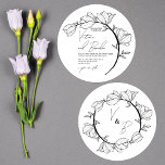 Modern Elegant Floral Circle Branch Wedding Invitation<br><div class="desc">This elegant and modern wedding invitation is perfect for the spring or summer. It features hand-drawn delicate line art flowers and leaves on a circle branch. The color scheme is black and white, and the typography includes a cursive script with a matching serif font. It's simple, pretty, minimal, and stylish;...</div>