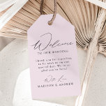 Modern Elegant Lavender Wedding Welcome Gift Tags<br><div class="desc">These elegant calligraphy wedding welcome gift tags are perfect for both casual and formal weddings. The design features a modern black calligraphy script with a lavender purple background or color of your choice. Personalize the lavender wedding welcome gift tags with a short welcome message, your names, etc. The minimalist wedding...</div>