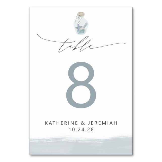 Modern Elegant Nautical Seashell Script Wedding Table Number (Front)