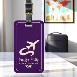 Modern Elegant Plane Purple Luggage Tag<br><div class="desc">A modern, elegant and feminine design with a stylized airplane on dark purple background, personalized with the traveler name and custom words "here we go again". A luggage tag with a name is important for several practical reasons when traveling. Firstly, it serves as a quick and easy way to identify...</div>