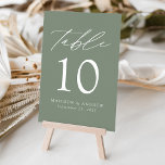 Modern Elegant Sage Green Wedding Table Number<br><div class="desc">Trendy, minimalist wedding table number cards featuring white modern lettering with "Table" in a modern calligraphy script. The design features a sage green background or color of your choice. The design repeats on the back. To order the table cards: add your name, wedding date, and table number. Add each number...</div>