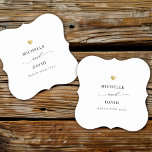 Modern Elegant Script Minimal Gold Wedding Favor Paper Coaster<br><div class="desc">Modern wedding party favor paper coaster with your custom names in elegant swirly script calligraphy,  the couple's names and the date of your celebration. This is the minimalist black and white version with a golden heart detail. Great also for bridal showers,  engagement or bachelorette parties.</div>