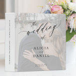 Modern elegant script wedding memories photo album 3 ring binder<br><div class="desc">Elegant trendy photo white overlay wedding planning and memories album scrapbook binder with "the wedding of" chic calligraphy script. Personalize it with your 2 photos,  bride and groom names,  and text.</div>