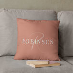 Modern Elegant Terracotta Monogram Initial Name Throw Pillow<br><div class="desc">This simple rustic terracotta throw pillow features your name and monogrammed initial written in a trendy, white minimalist typography. Simply add the name and initial in the personalize section to create your own customized throw pillow. This earth tone, terracotta colored throw pillow makes the perfect addition to your rustic home...</div>