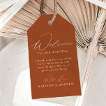 Modern Elegant Terracotta Wedding Welcome Gift Tags<br><div class="desc">These elegant calligraphy wedding welcome gift tags are perfect for both casual and formal weddings. The design features a modern white calligraphy script with a terracotta background or color of your choice. Personalize the terracotta wedding welcome gift tags with a short welcome message, your names, etc. The minimalist wedding gift...</div>