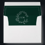 Modern Emerald Green Leafy Crest Monogram Wedding Envelope<br><div class="desc">We're loving this trendy, modern emerald green wedding envelope! Simple, elegant, and oh-so-pretty, it features a hand drawn leafy wreath encircling a modern wedding monogram. View suite here: https://www.zazzle.com/collections/emerald_green_leafy_crest_monogram_wedding-119957580948924617 Contact designer for matching products to complete the suite, OR for color variations of this design. Copyright Anastasia Surridge for Elegant Invites,...</div>