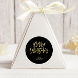 Modern Faux Gold Typography | Merry Christmas Classic Round Sticker<br><div class="desc">These stylish holiday stickers say "Merry Christmas" in trendy,  faux gold typography on a black background. Personalize with your name.</div>