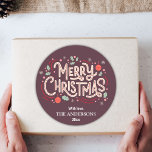 Modern festive burgundy & white Merry Christmas  Classic Round Sticker<br><div class="desc">Celebrate the holidays in style with this modern round sticker featuring a burgundy background and cheerful white and red typography. The "Merry Christmas" message is adorned with holly, snowflakes, and baubles, creating a playful yet elegant design. Customizable with your family name and year, this sticker is perfect for adding a...</div>