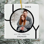 Modern First Christmas Engaged Photo Ceramic Ornam Ornament<br><div class="desc">This modern First Christmas Engaged Photo Ornament is decorated with the word JOY in black on a white background.
Easily customizable with your photo and name.</div>