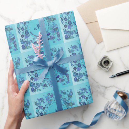 Modern geometric shapes with monogram in blue wrapping paper