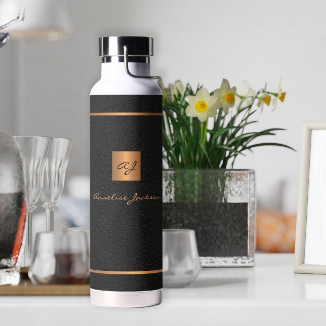 Modern gold black monogram and name personalized water bottle (Creator Uploaded)