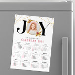 Modern Gold Family Photo Christmas Calendar<br><div class="desc">This modern Christmas Calendar features a sleek and stylish design with a touch of festive elegance. The front of the Calendar showcases a beautiful "JOY" design with a delicate golden frame, perfect for incorporating a treasured family photo. The unique geometric pattern with a subtle golden sheen adds a touch of...</div>