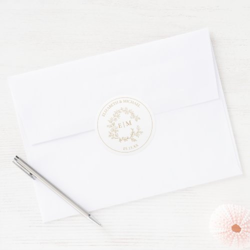 Modern Gold Leafy Crest Monogram Wedding Classic Round Sticker - We're loving this trendy, modern gold wedding Envelope Seal! Simple, elegant, and oh-so-pretty, it features a hand drawn leafy wreath encircling a modern wedding monogram. It is personalized in elegant typography, Finally, it is trimmed in a delicate frame. Veiw suite here: https://www.zazzle.com/collections/gold_leafy_crest_monogram_wedding-119668631605460589 Contact designer for matching products to complete the suite, OR for color variations of this design. Thank you sooo much for supporting our small business, we really appreciate it! 
We are so happy you love this design as much as we do, and would love to invite
you to be part of our new private Facebook group Wedding Planning Tips for Busy Brides. 
Join to receive the latest on sales, new releases and more! 
https://www.facebook.com/groups/622298402544171  
Copyright Anastasia Surridge for Elegant Invites, all rights reserved.