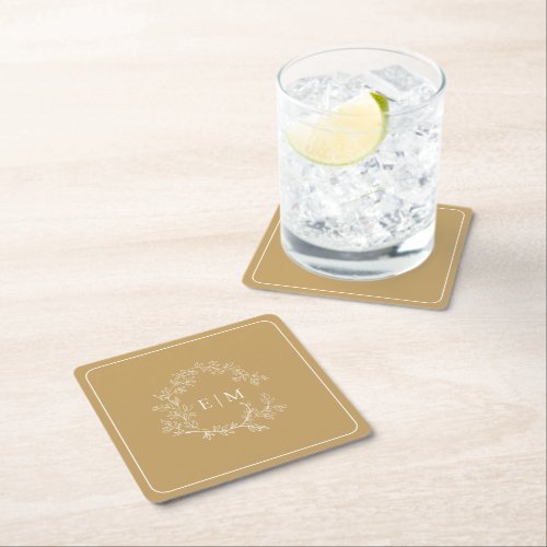 Modern Gold Leafy Crest Monogram Wedding Square Pa Square Paper Coaster - A unique wedding coaster! We're loving this trendy, modern gold wedding design! Simple, elegant, and oh-so-pretty, it features a hand drawn leafy wreath encircling a modern wedding monogram. It is personalized in elegant typography. Finally, it is trimmed in a delicate frame. Veiw suite here: https://www.zazzle.com/collections/gold_leafy_crest_monogram_wedding-119668631605460589 Contact designer for matching products to complete the suite, OR for color variations of this design. Thank you sooo much for supporting our small business, we really appreciate it! 
We are so happy you love this design as much as we do, and would love to invite
you to be part of our new private Facebook group Wedding Planning Tips for Busy Brides. 
Join to receive the latest on sales, new releases and more! 
https://www.facebook.com/groups/622298402544171  
Copyright Anastasia Surridge for Elegant Invites, all rights reserved.