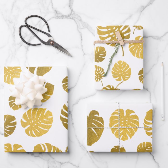 Modern Gold Monstera Tropical Leaves Pattern Wrapping Paper Sheets (Front)