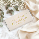 Modern Gold Mr and Mrs Wedding Hershey Bar Favors<br><div class="desc">A warm and luminous wedding favor wrapper showcasing "Mr and Mrs" in graceful calligraphy script with the couple's surname featured as the central monogram element. Soft gold tones against a white background create a classic yet contemporary look with understated elegance. Customize the names and date for a beautifully personalized guest...</div>