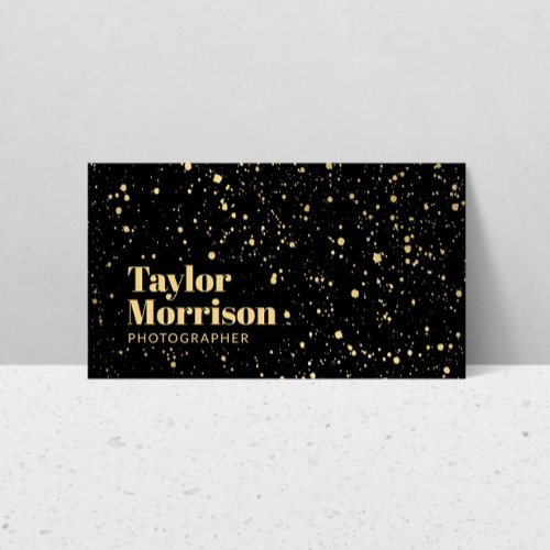Modern Gold Paint Splatter Pattern on Black Business Card