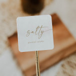 Modern Gold Script Salty Wedding Favor Square Sticker<br><div class="desc">These modern gold script salty wedding favor stickers are perfect for a minimalist wedding. The simple yellow gold color design features unique industrial lettering typography with modern boho style. Customizable in any color. Keep the design minimal and elegant, as is, or personalize it by adding your own graphics and artwork....</div>