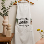 Modern Grandma's Kitchen Is Always Open Best Gift Apron<br><div class="desc">Welcome to Grandma's Kitchen, where love and warmth are always on the menu! Delight your favorite grandmother with this charming gift product from Zazzle. Whether it's for Mother's Day, her birthday, or just to show appreciation, this thoughtful item is sure to bring a smile to her face.Surprise Grandma with a...</div>
