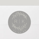 Modern Gray Botanical Initials Wedding Monogram Cl Classic Round Sticker<br><div class="desc">Custom-designed wedding monogram stickers featuring elegant hand drawn style white beige botanical wreath with couple's initials and wedding date on gray background. Perfect for wedding save the dates,  envelops,  wedding favor packagings and more.</div>