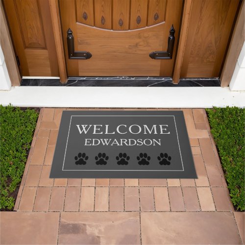 Modern gray burlap Welcome family name dog paws Doormat