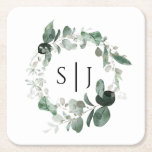 Modern Greenery White Wedding Monogram Square Paper Coaster<br><div class="desc">This modern greenery white wedding monogram square paper coaster design features easy mix and match coordinating styles in black and white with delicate greenery elements adding graceful flourish around simple sophisticated typography and lovely minimal calligraphy script. The watercolor eucalyptus and other botanical leaves arch beautifully throughout, with dark emerald fading...</div>