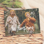 Modern Hand-Lettered Family Name 2 Photo Holiday Card<br><div class="desc">Full photo and script family name Christmas holiday cards. Replace with your photos and wish your friends and family a merry Christmas, a happy new year, or any custom text or alternate greeting this holiday season! This design showcases one or two of your favorite photos from this year. There is...</div>