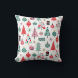 Modern Holiday Cushion | Cozy Christmas Pattern<br><div class="desc">Bring a burst of festive charm to your home with this Christmas throw pillow, designed in a playful mix of pink, red, and teal. The cheerful pattern of holiday trees, ornaments, snowflakes, and little gift boxes creates a joyful accent that feels both modern and cozy. Whether tossed on the sofa,...</div>